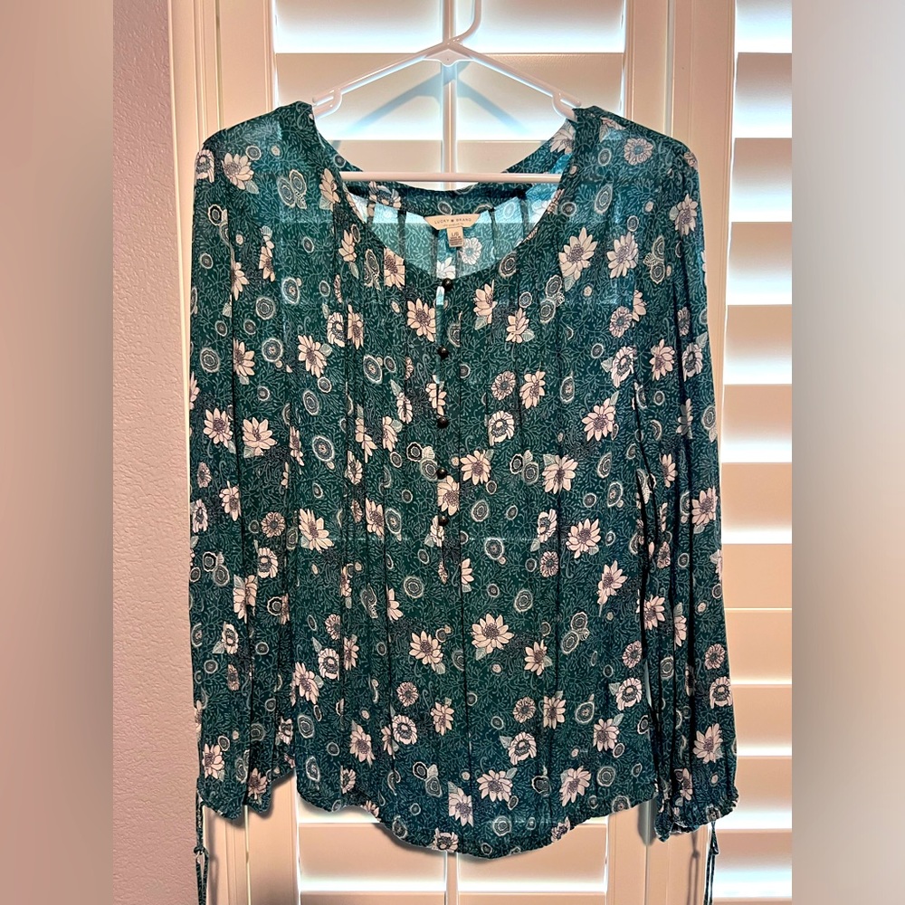 Green Lucky floral top.